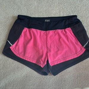 Athleta Girl large / size 12 lined shorts charcoal gray and pink